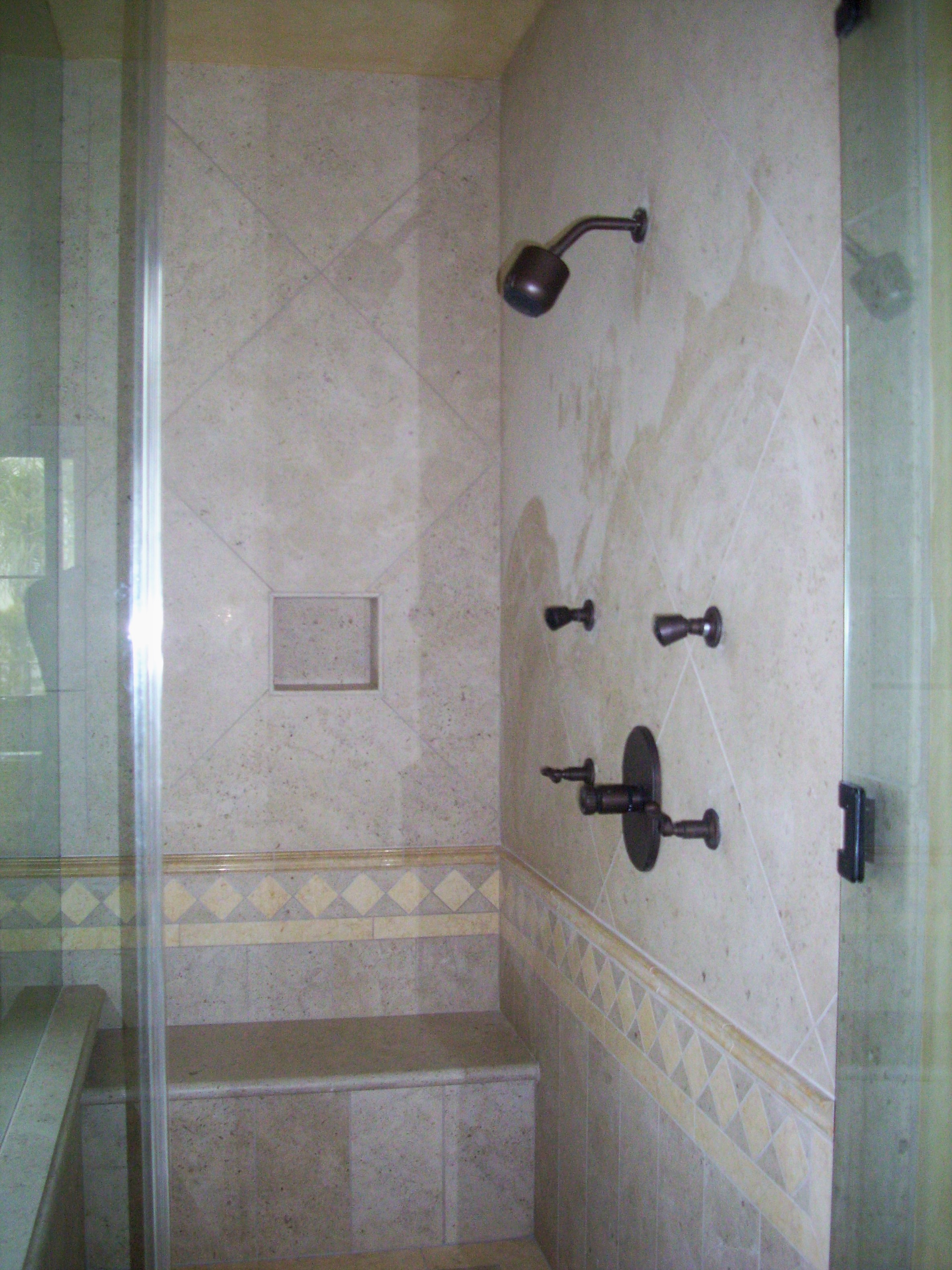 natural stone shower design, shower seat