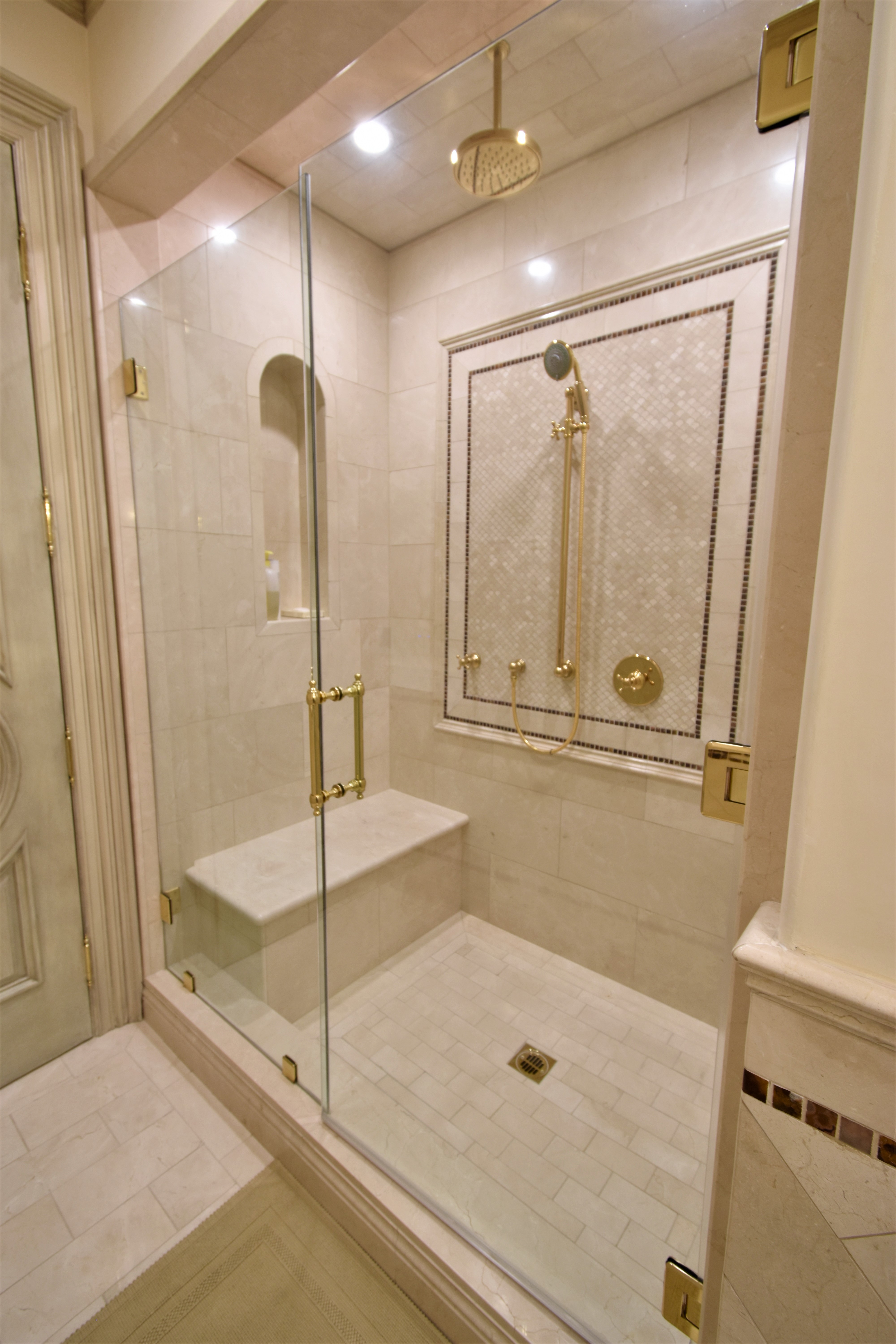 custom shower design, mosaic, shower seat, niche 