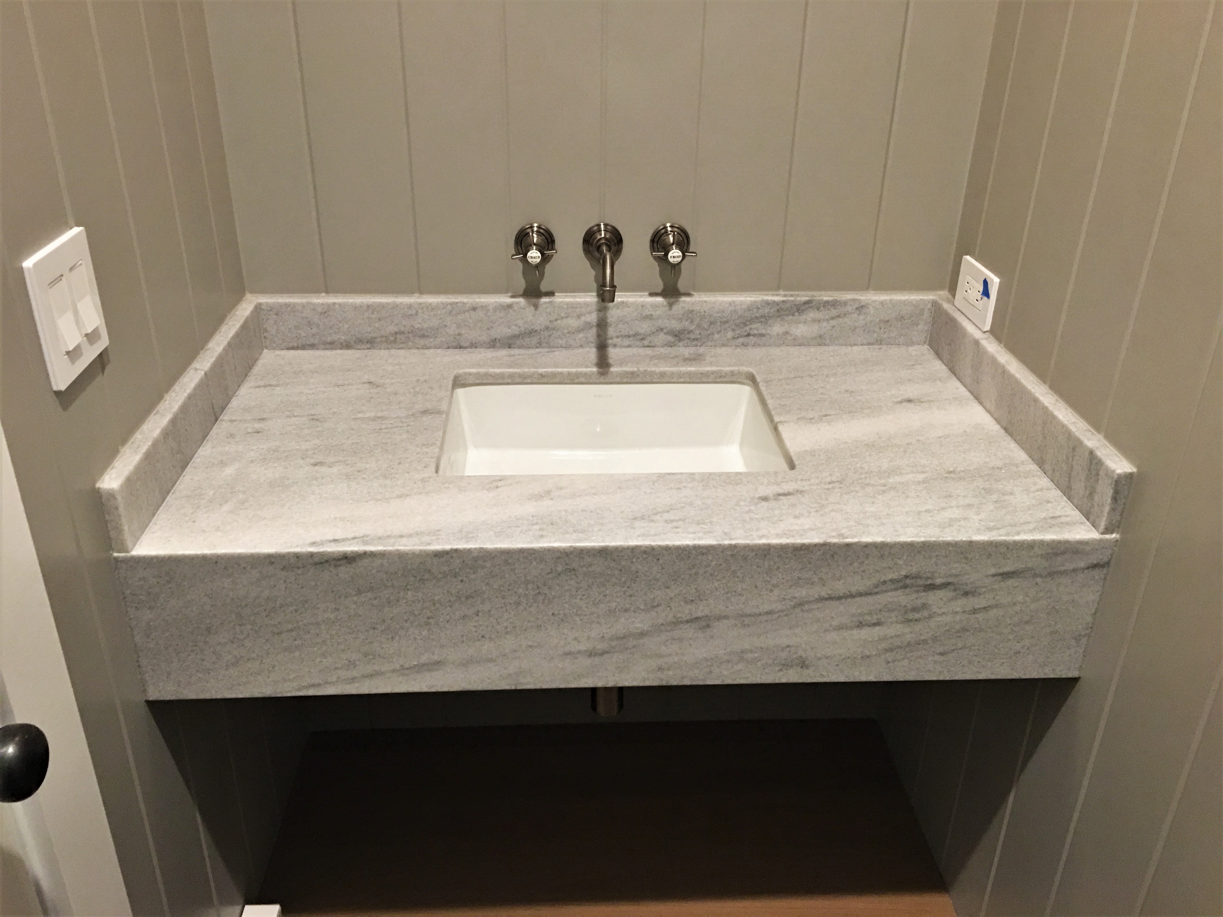 slab stone counter top with backsplash