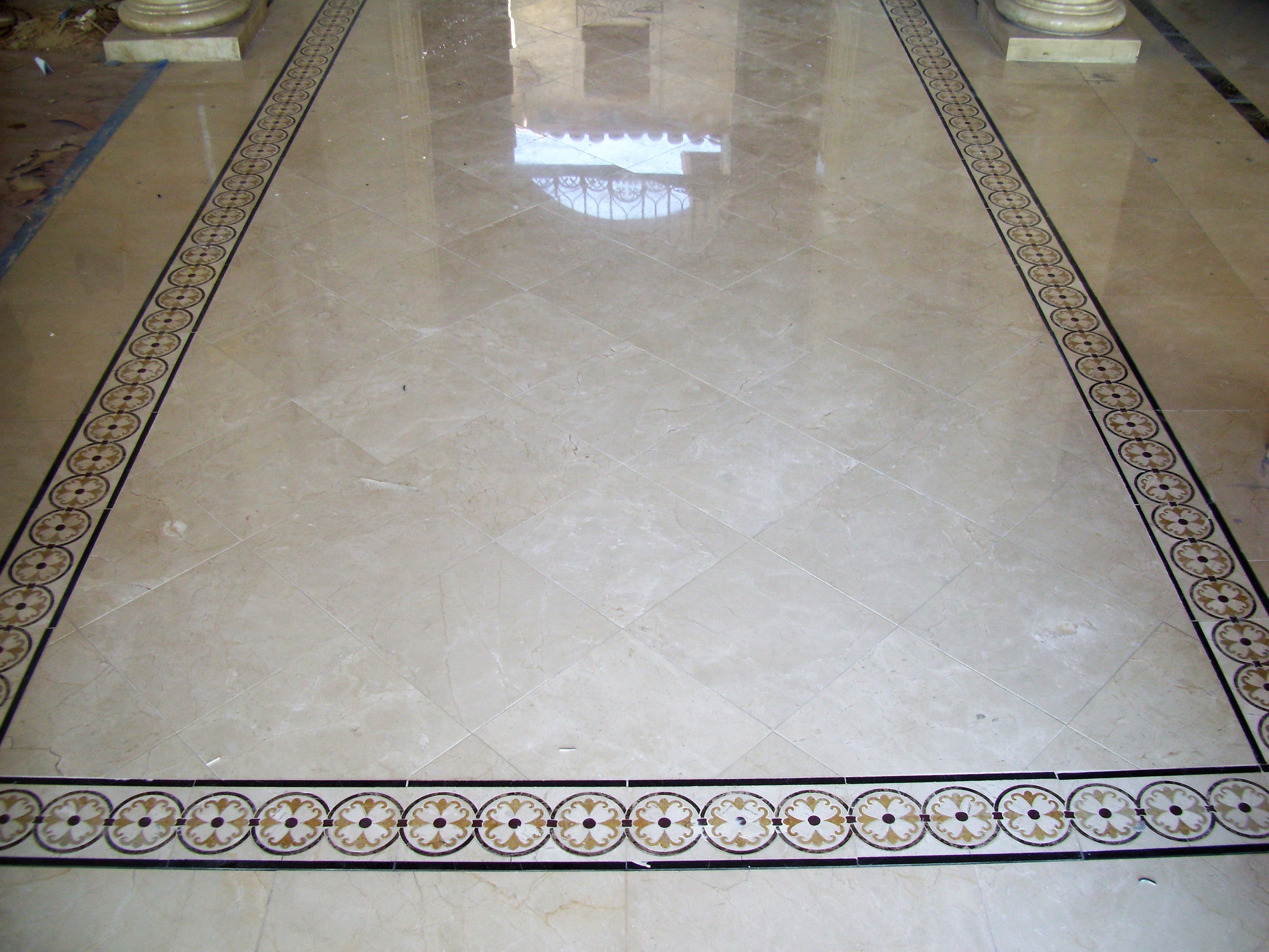 Natural stone floor design, custom work, mosaic